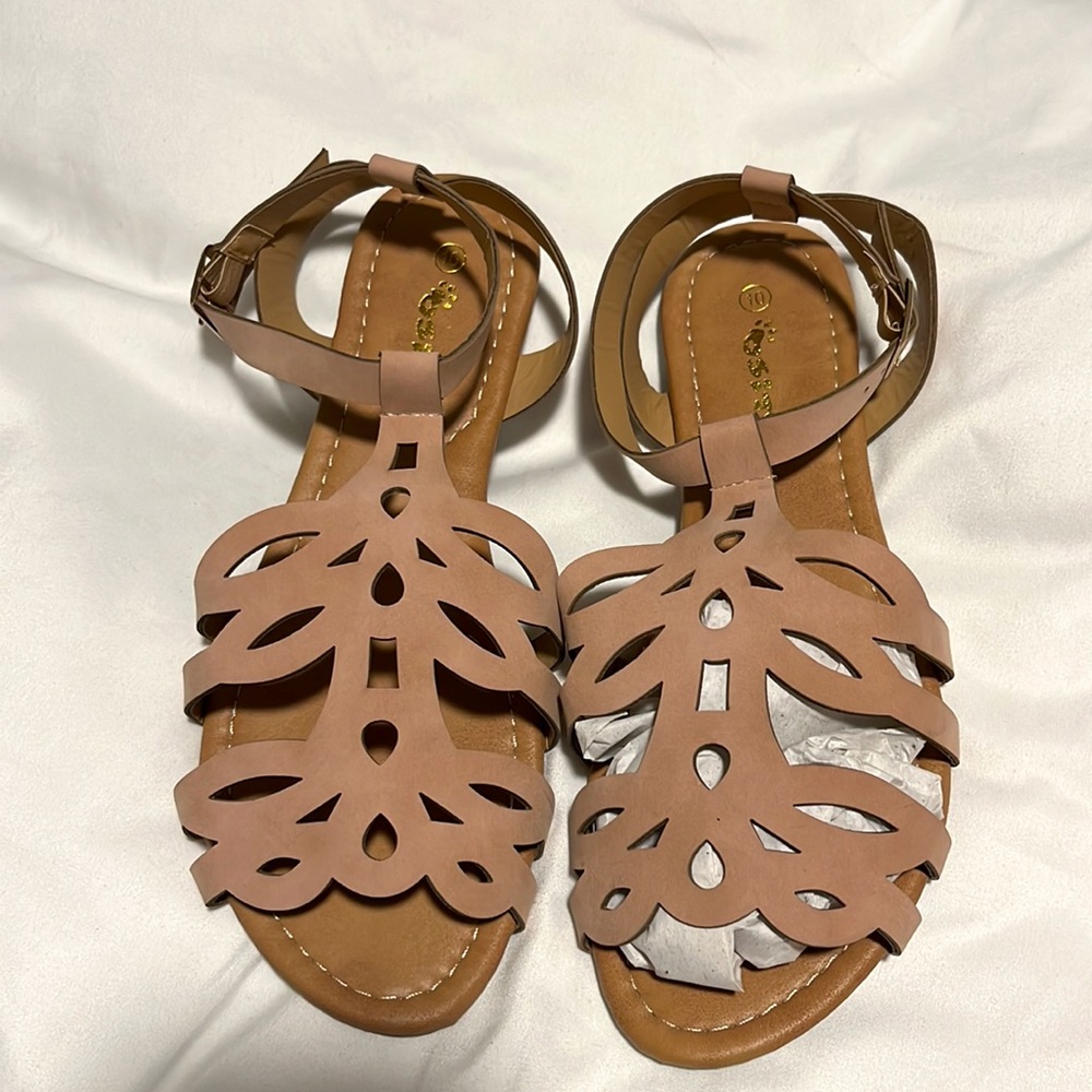 Size 10, brand new, never been worn sandals